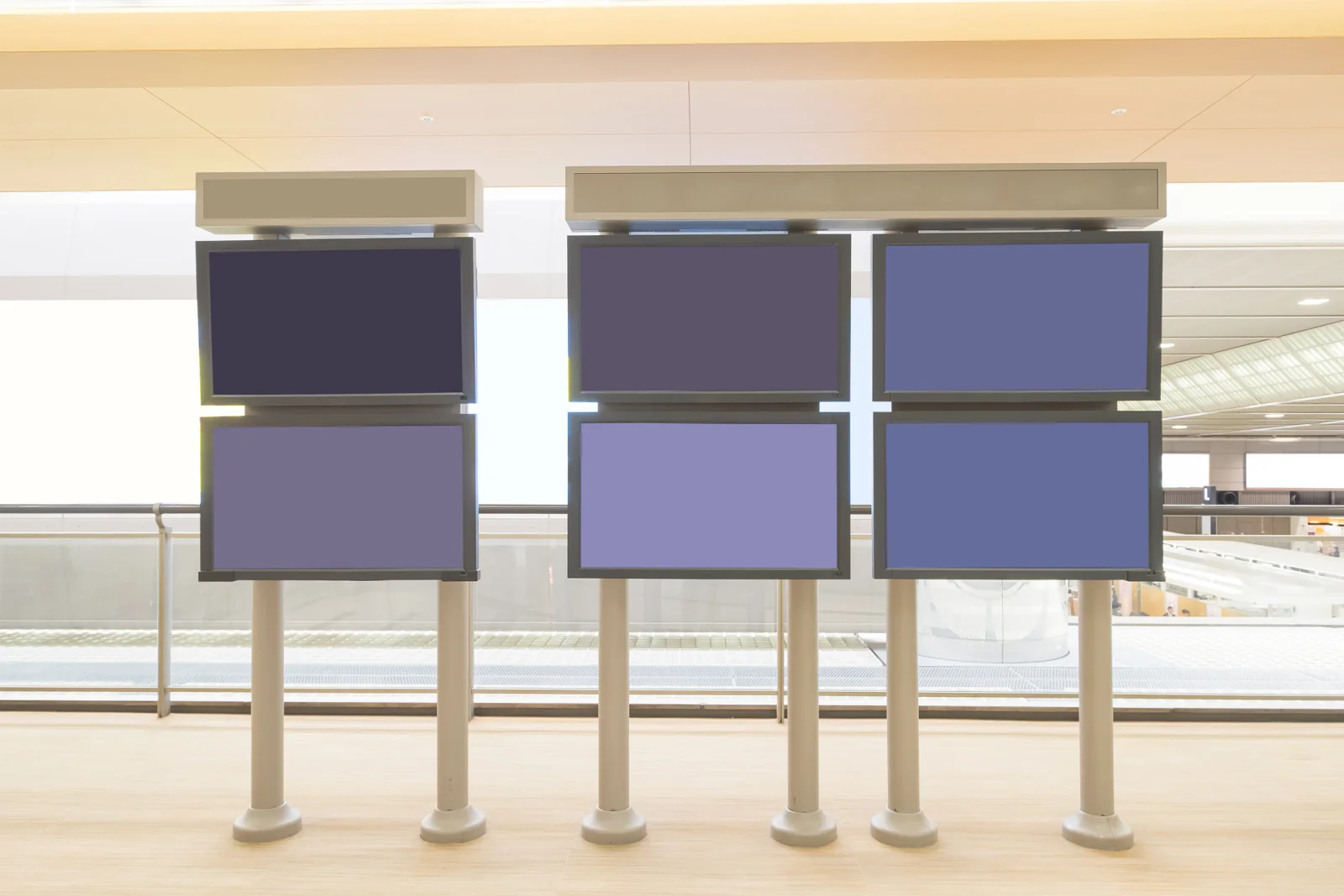 Multiple monitors on a production control desk for event operations and content management