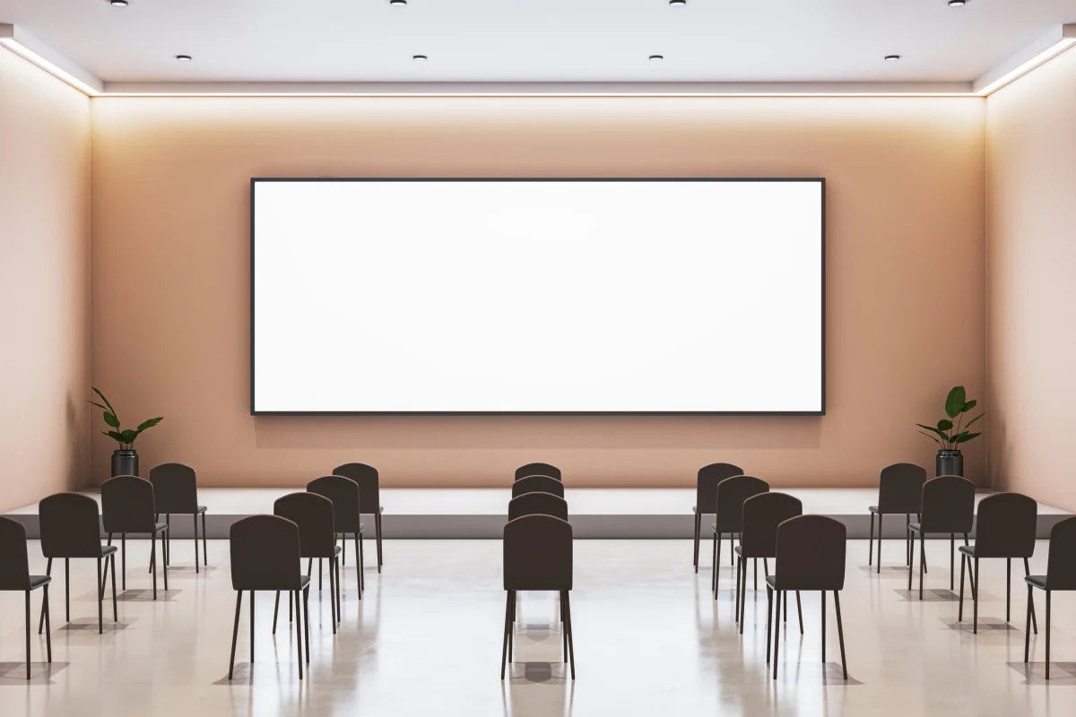 Conference stage setup with screens lighting sound and presentation support for keynote sessions