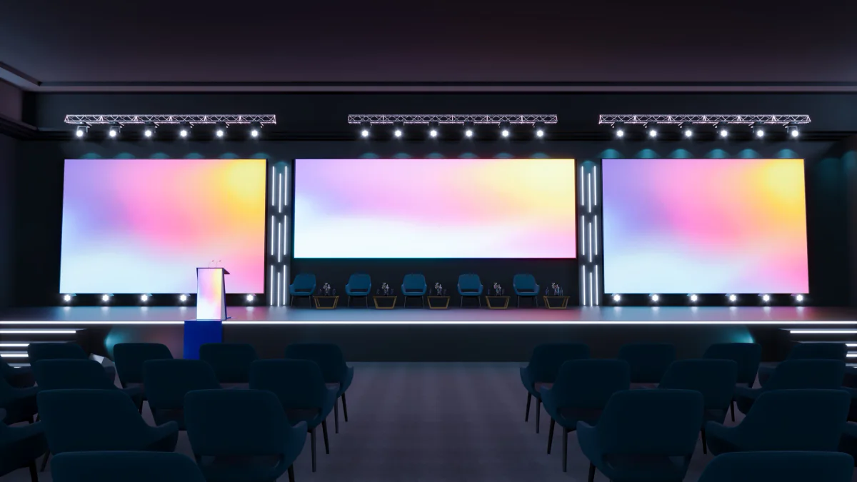 Hybrid event setup with cameras lighting microphones and streaming equipment for live and remote audiences