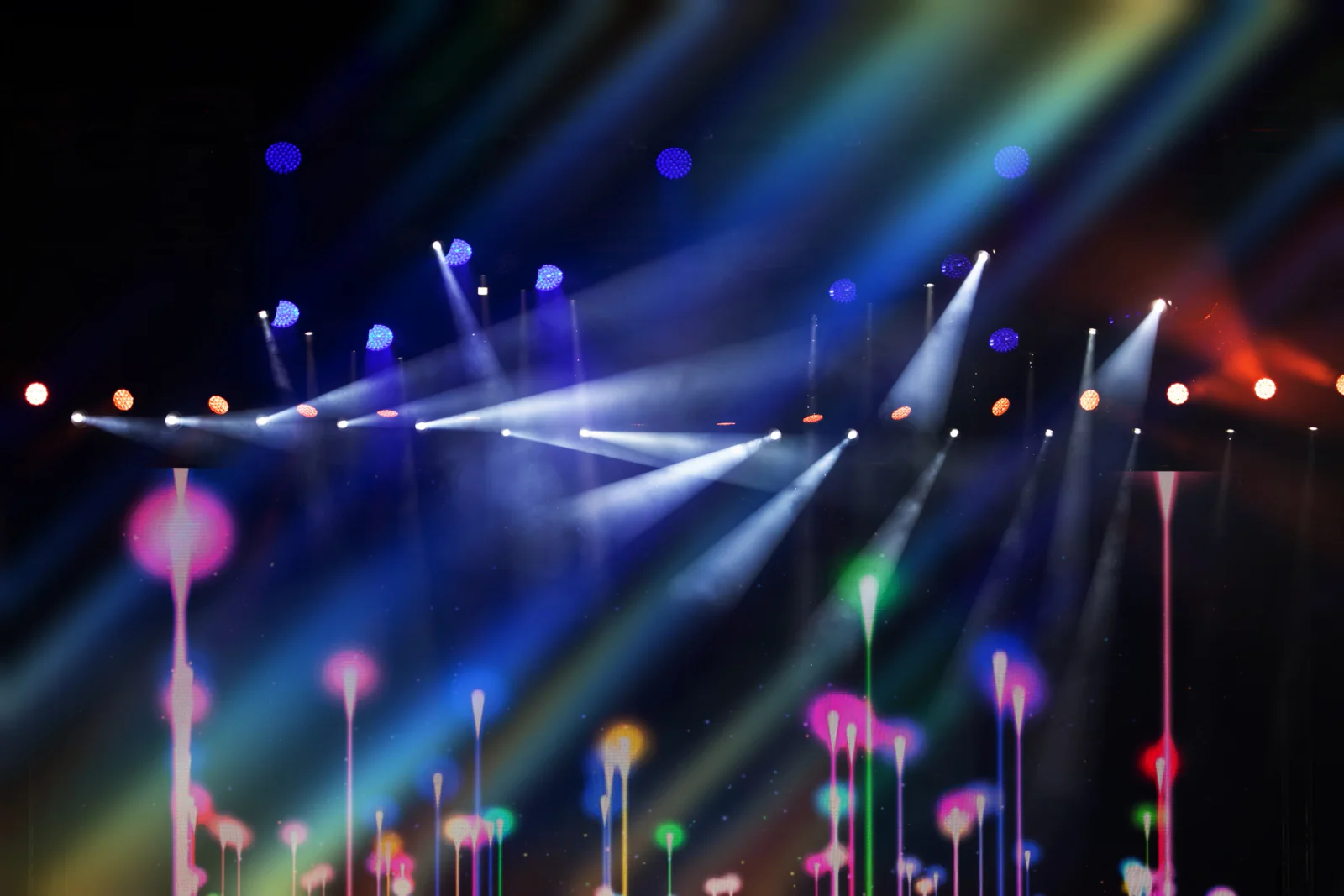 Colored uplighting on a ballroom wall for branded event atmosphere and venue enhancement