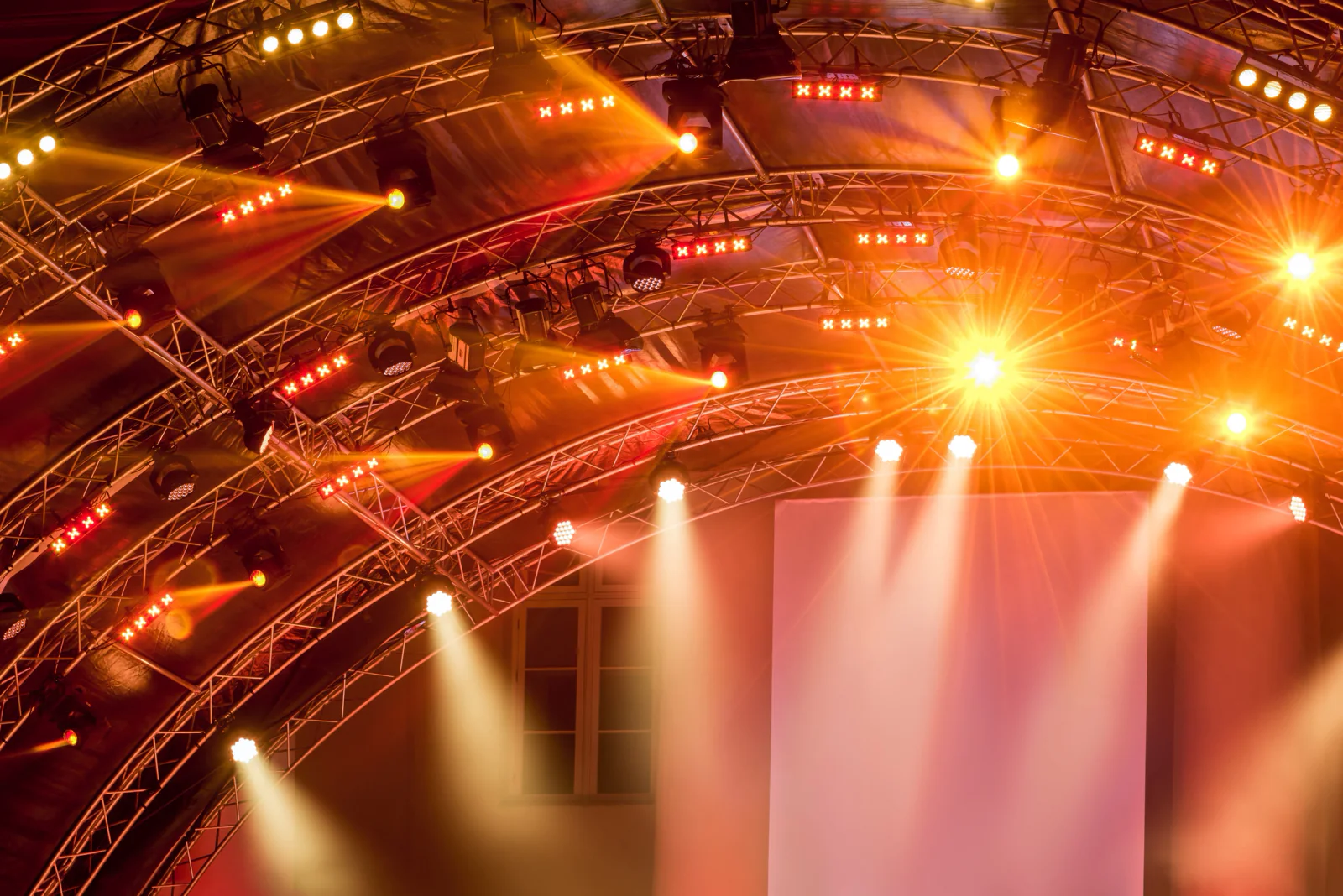 Sponsor wall with colored lighting for branded event atmosphere and visual impact