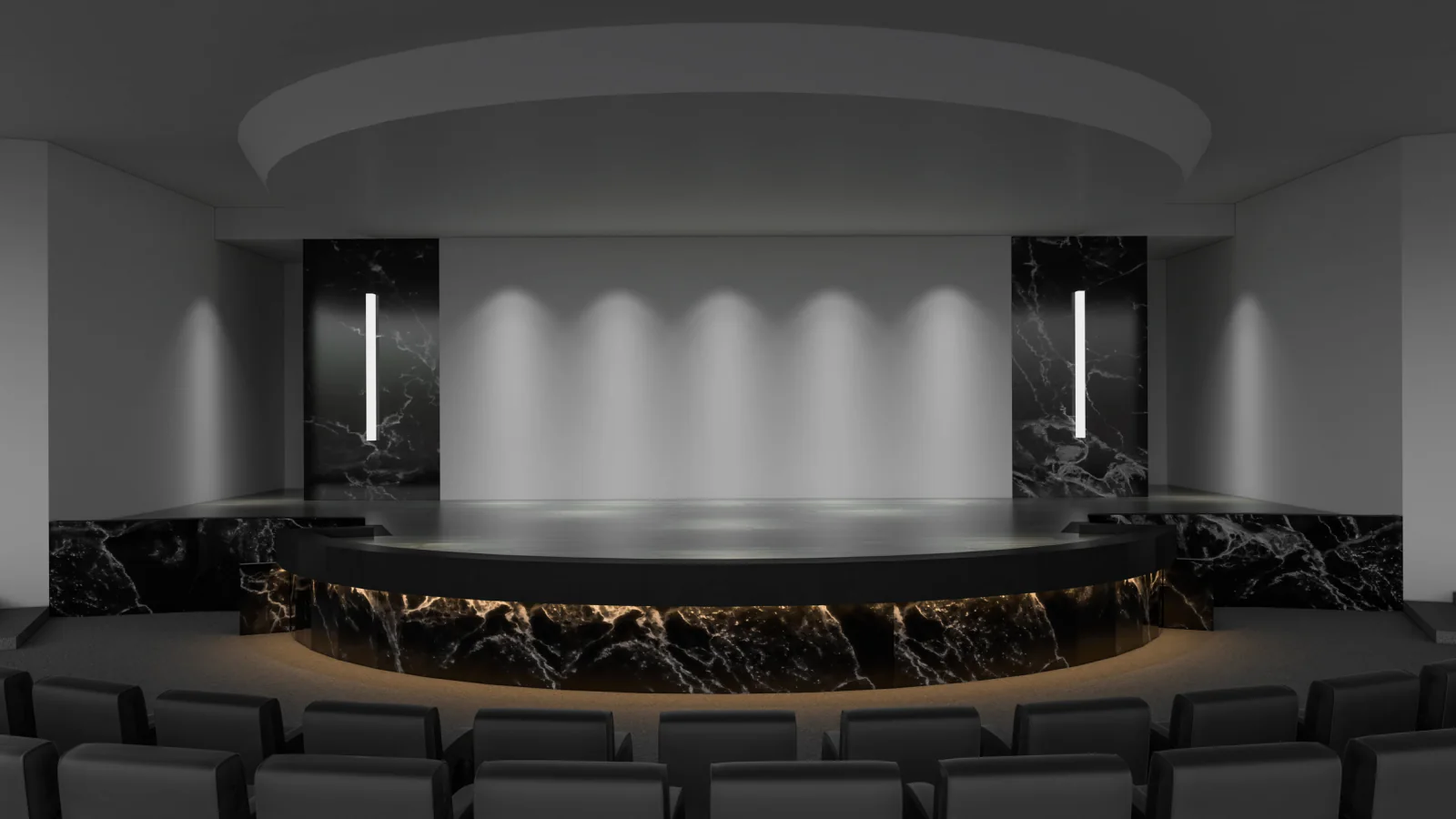 Stage with backdrop and screen for keynote sponsor branding and polished event presentation