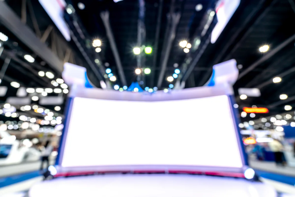 Trade show video wall setup used as a branded booth centerpiece for attendee engagement