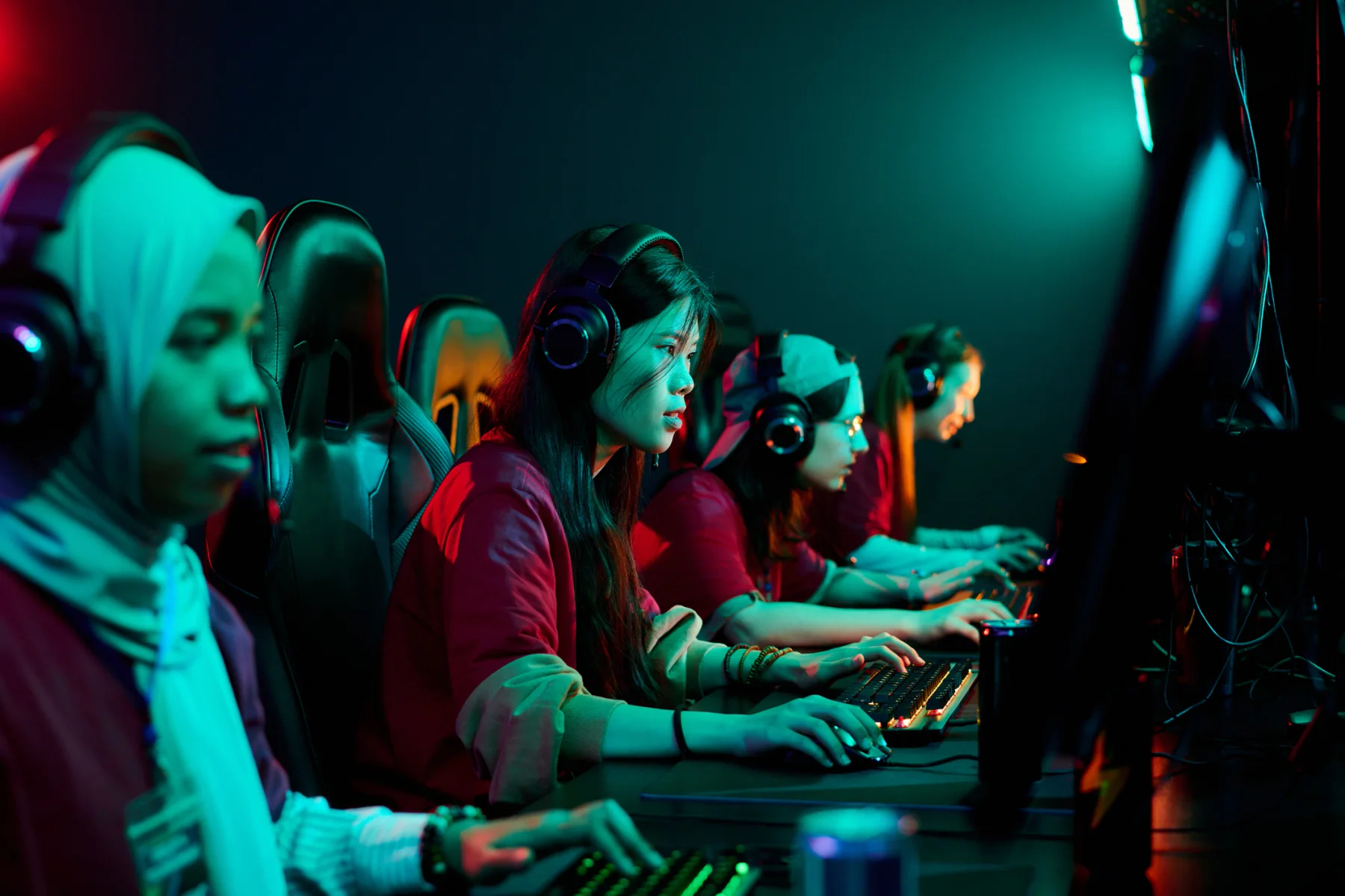 Gaming monitors arranged for esports competition stations and interactive event activations