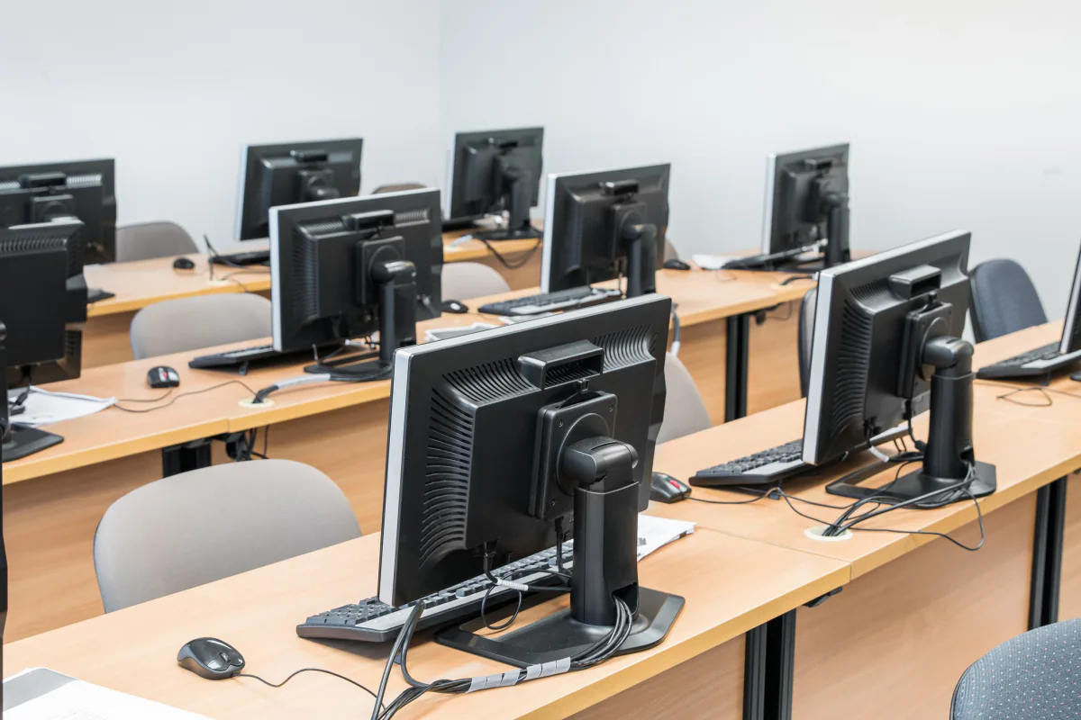 Business desktop computer workstations prepared for office productivity, training, and temporary staffing