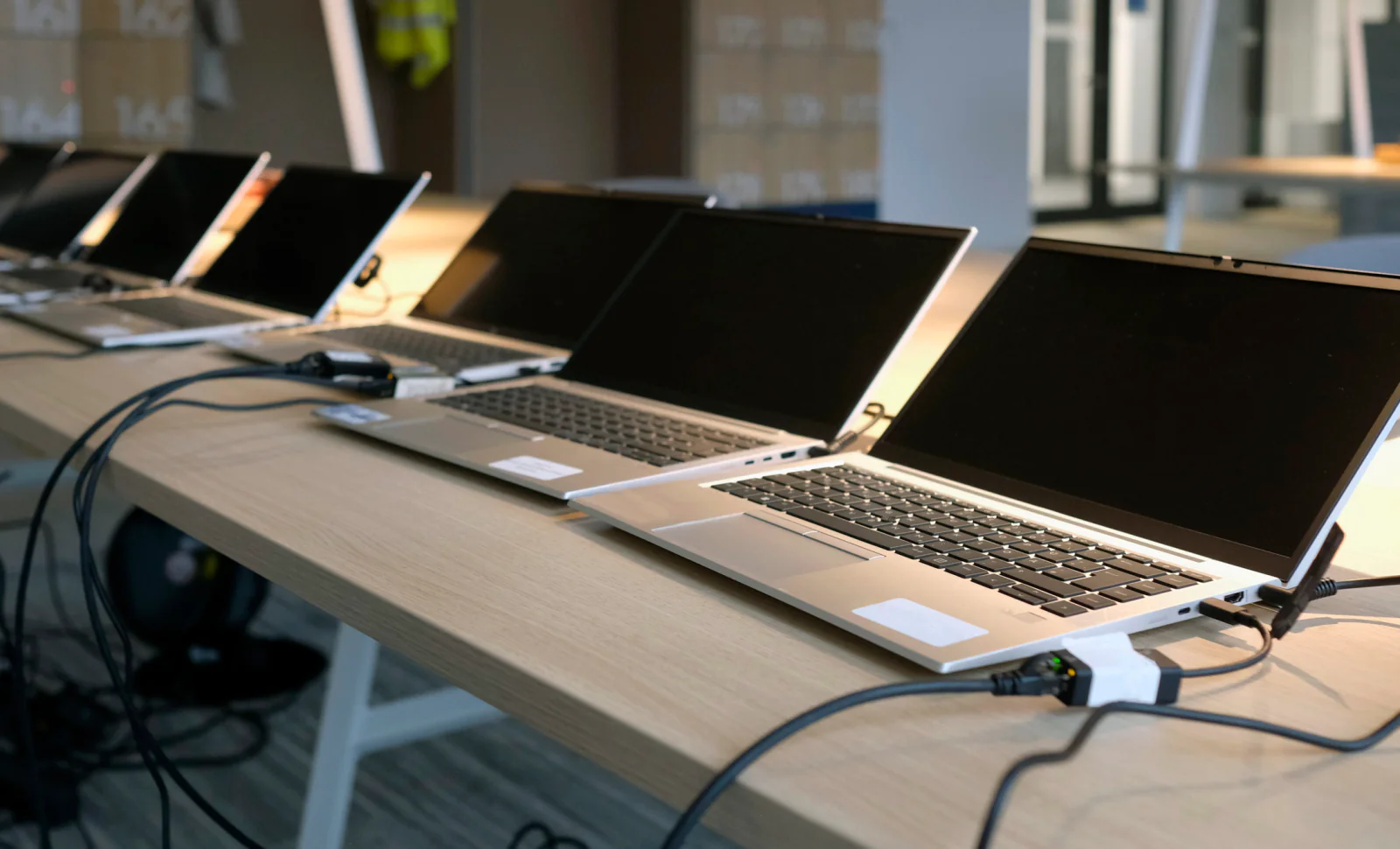 Temporary classroom during school renovation with rented computers, displays, and student workstations