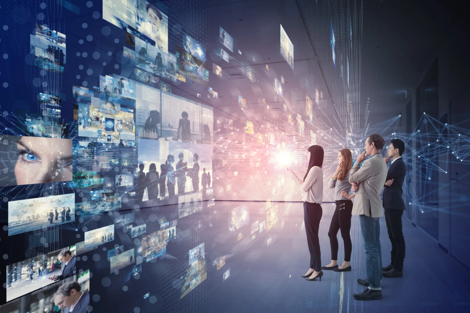 Attendees interacting with a large immersive digital display wall as part of an experiential marketing installation