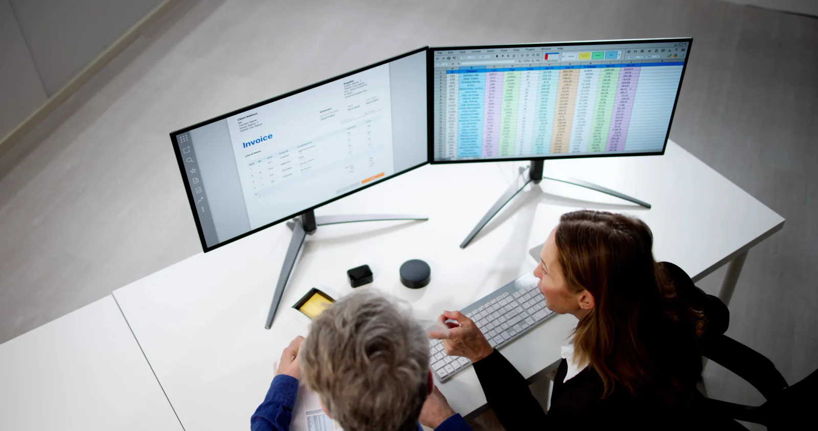 Legal review center with attorneys and staff using dual-monitor workstations, document scanners, and secure office equipment