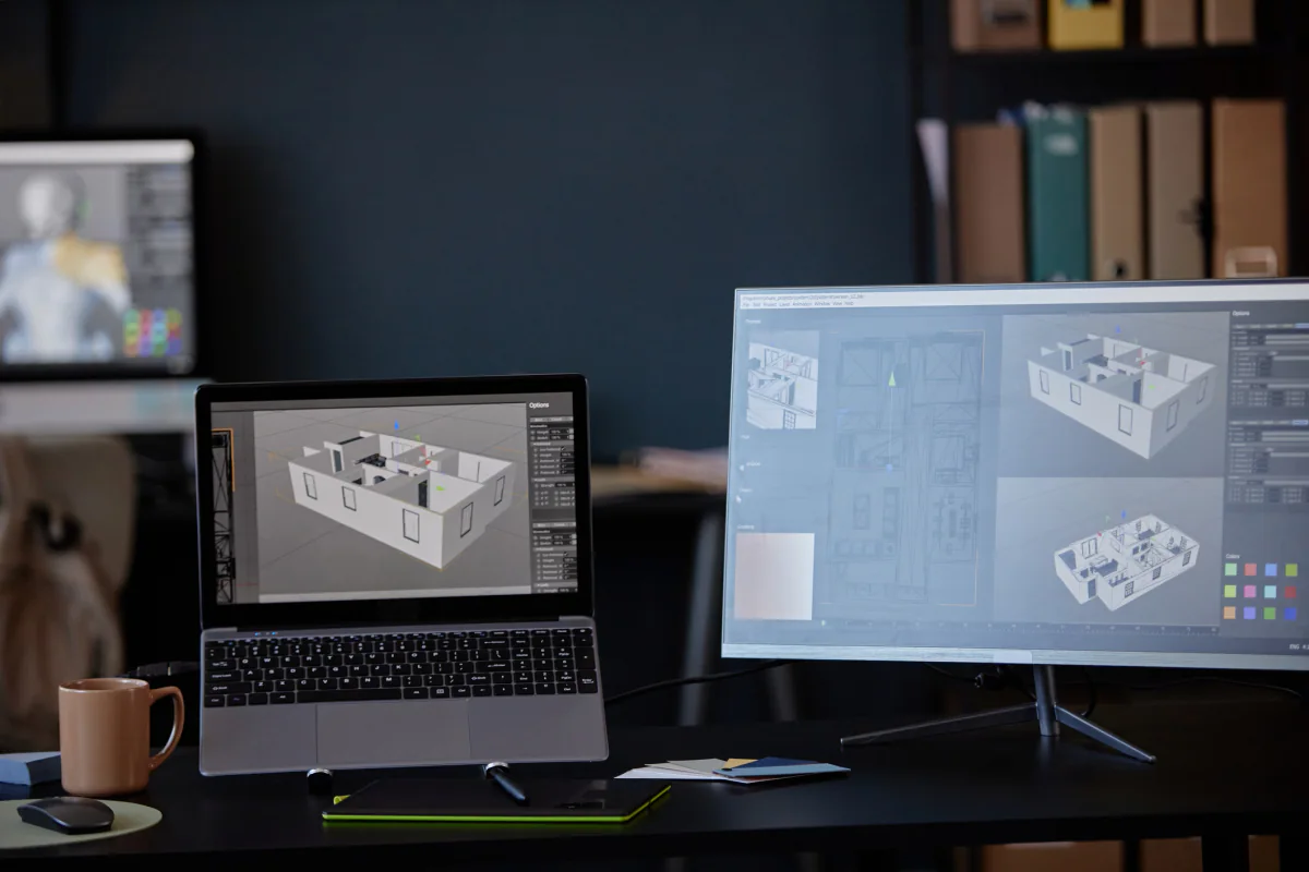 Mobile workstation laptops running CAD and 3D modeling software in an engineering office environment