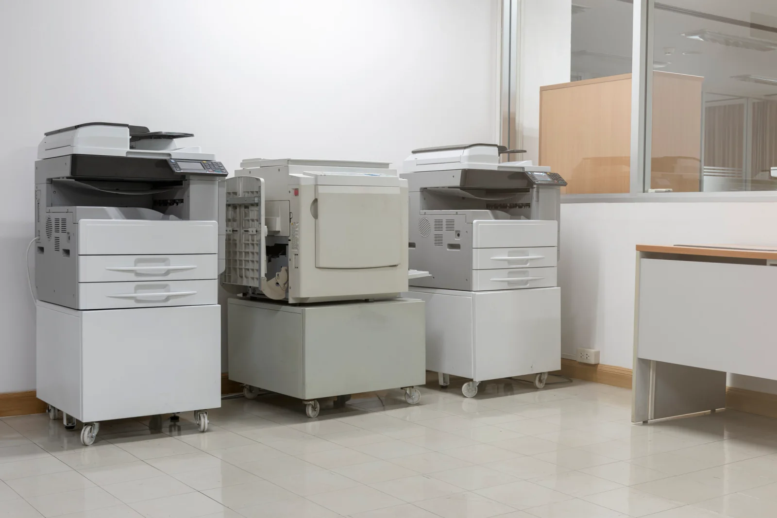 Color copier with printed color documents in the output tray for presentations and client-facing office use