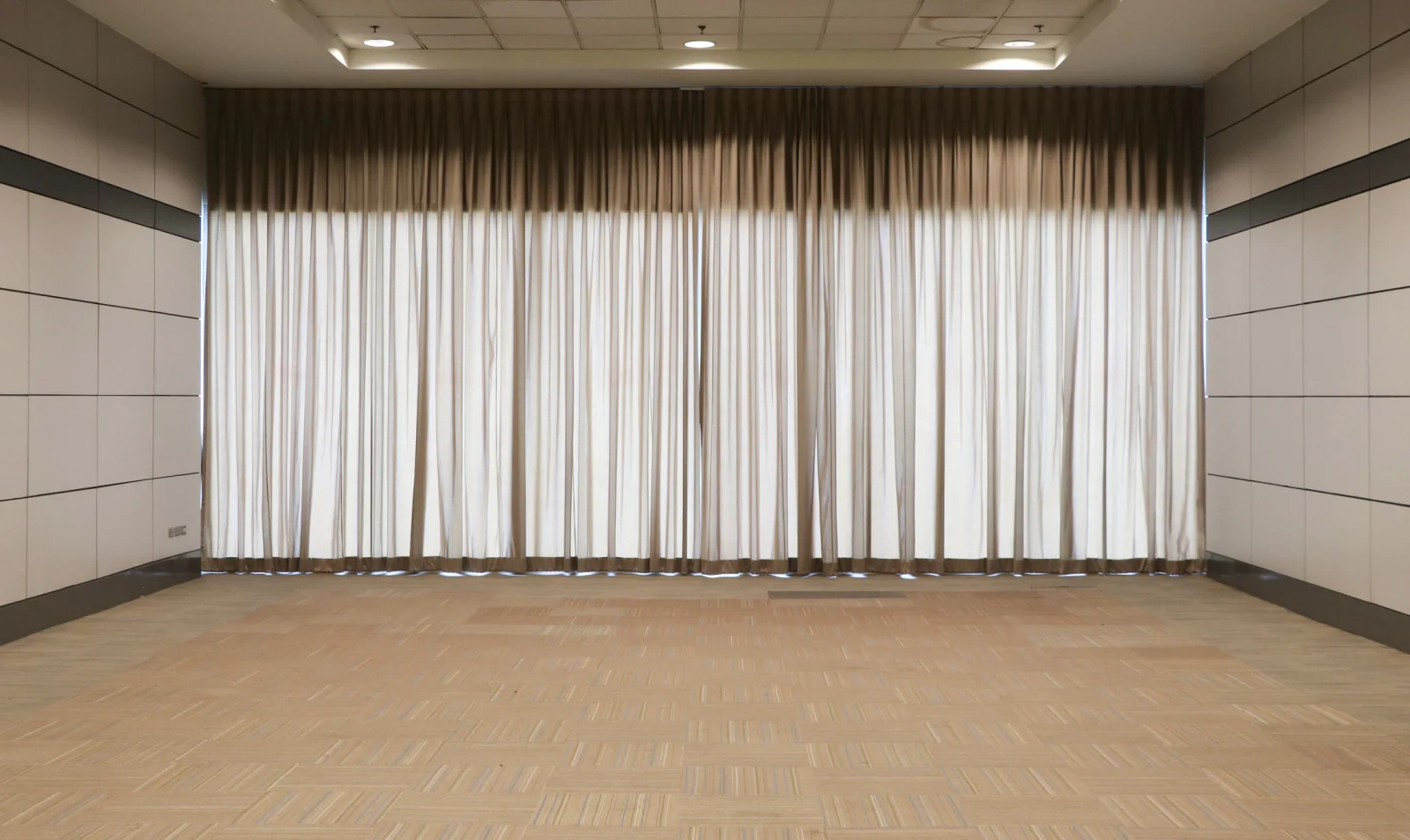 Pipe and drape configuration dividing event spaces and shaping attendee traffic flow inside a ballroom