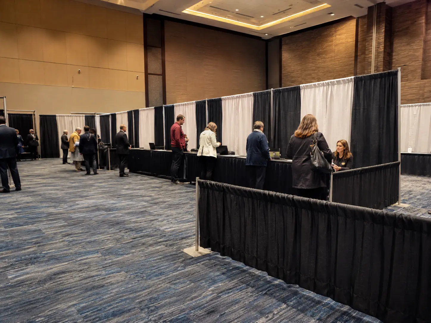 Pipe and drape backdrop in a conference or meeting room for stage presentation and cleaner sightlines
