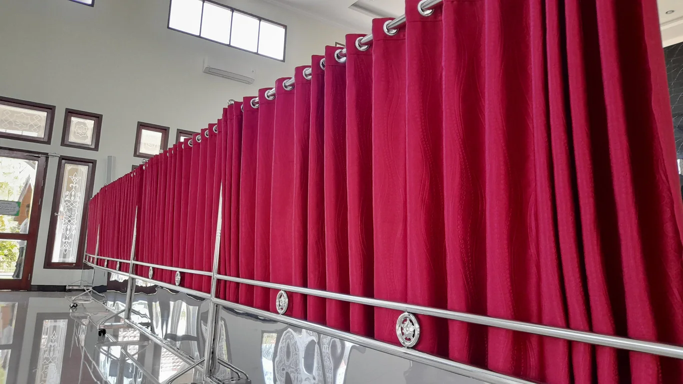 Pipe and drape used to hide backstage production areas and improve event flow in a corporate venue
