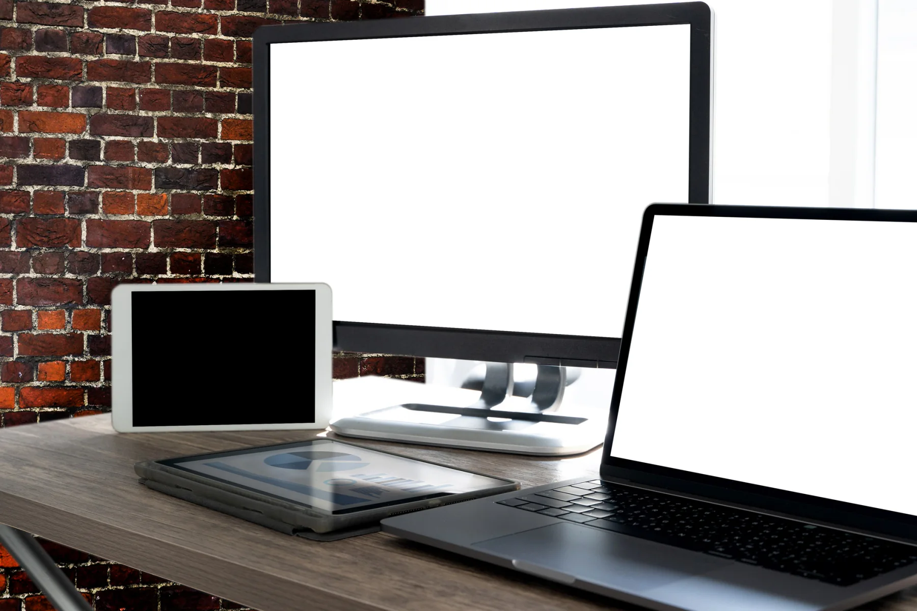 Variety of rental technology products including laptops, tablets, displays, and office equipment used across business and event environments