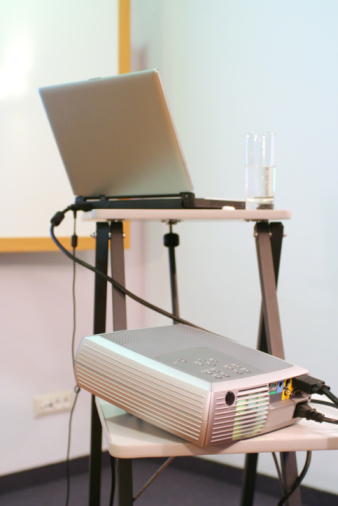 Rent a projector, laptop with Powerpoint and screen