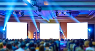 Conference with event lighting and staging