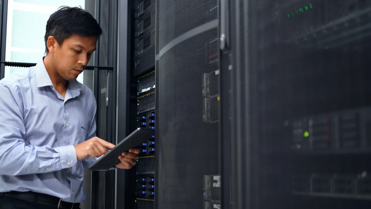 Infrastructure migration project team using rental servers for staging replication and cutover preparation