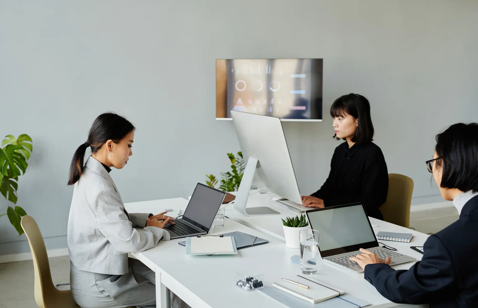 Project room with laptops, monitors, printers, and office support equipment used by a temporary operations team