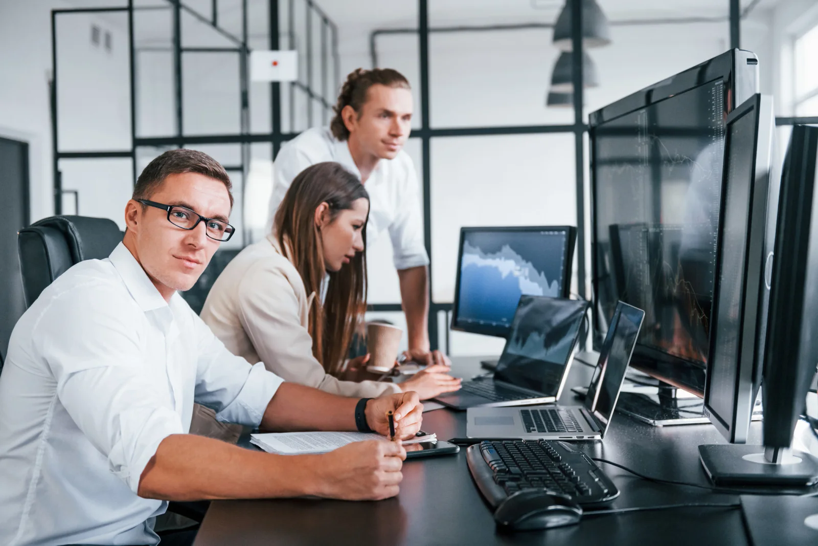 Operations team coordinating equipment deliveries, receiving schedules, and access windows for a business facility or temporary workspace