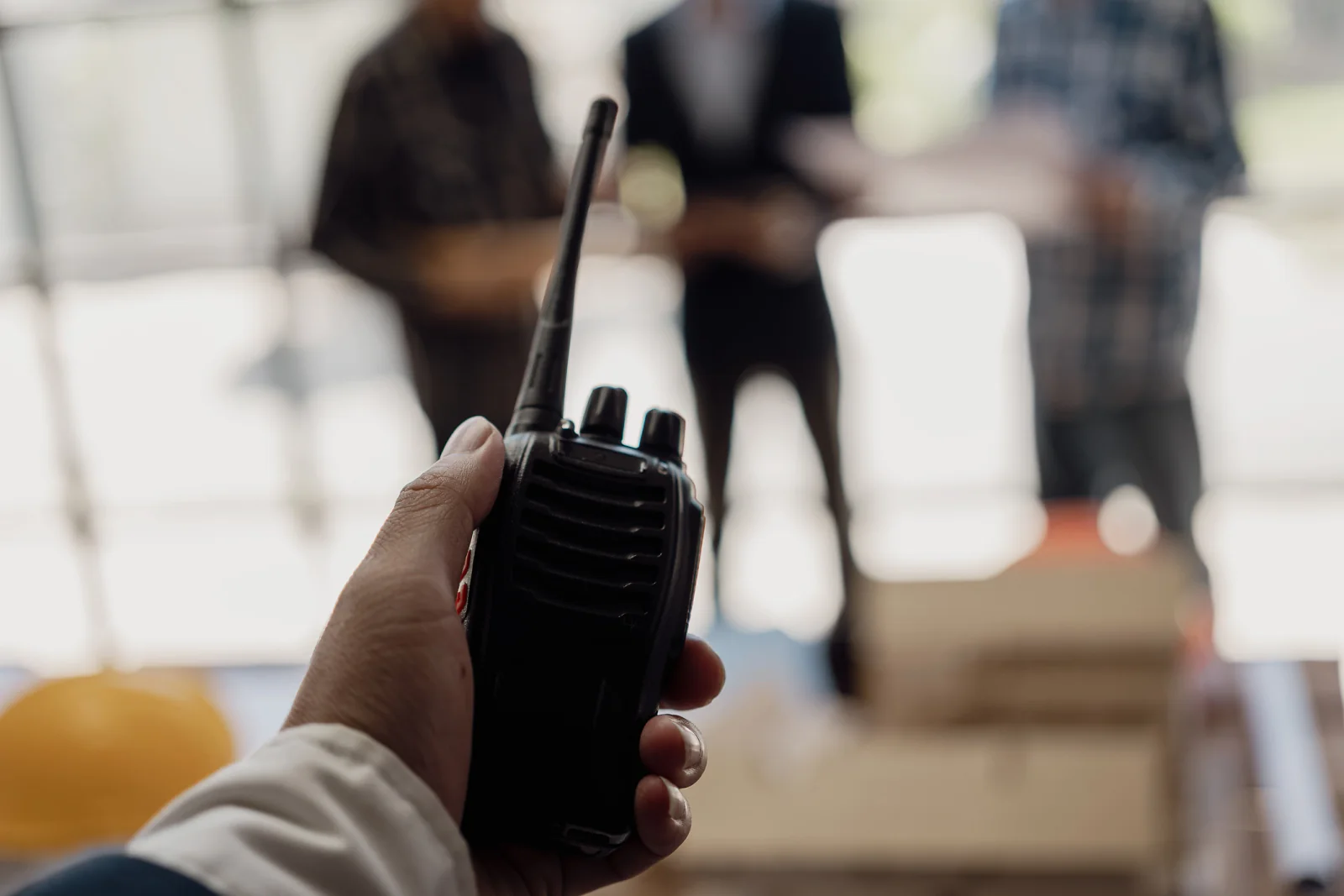 Handheld two way radio rentals arranged with chargers and accessories for event operations and venue staff coordination