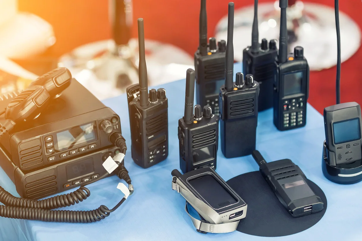 Charging bank with multiple two way radios prepared for a multi day event staff deployment