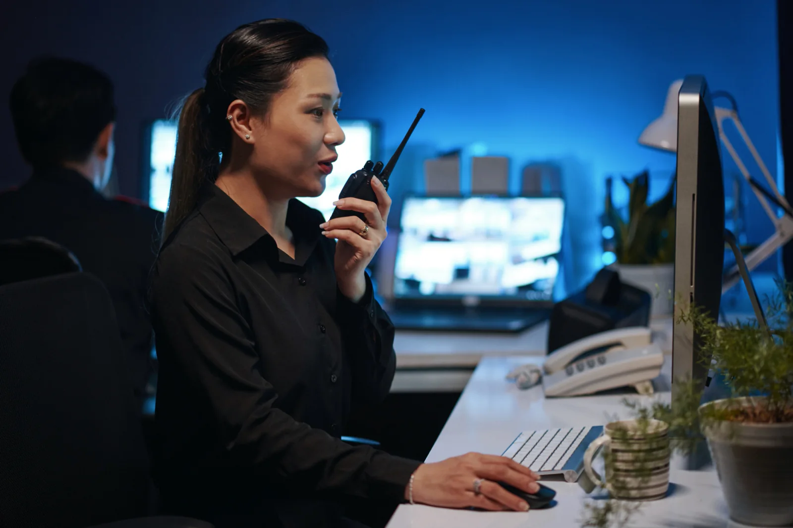 Hotel and conference center staff using two way radios across a large venue footprint for coordinated operations