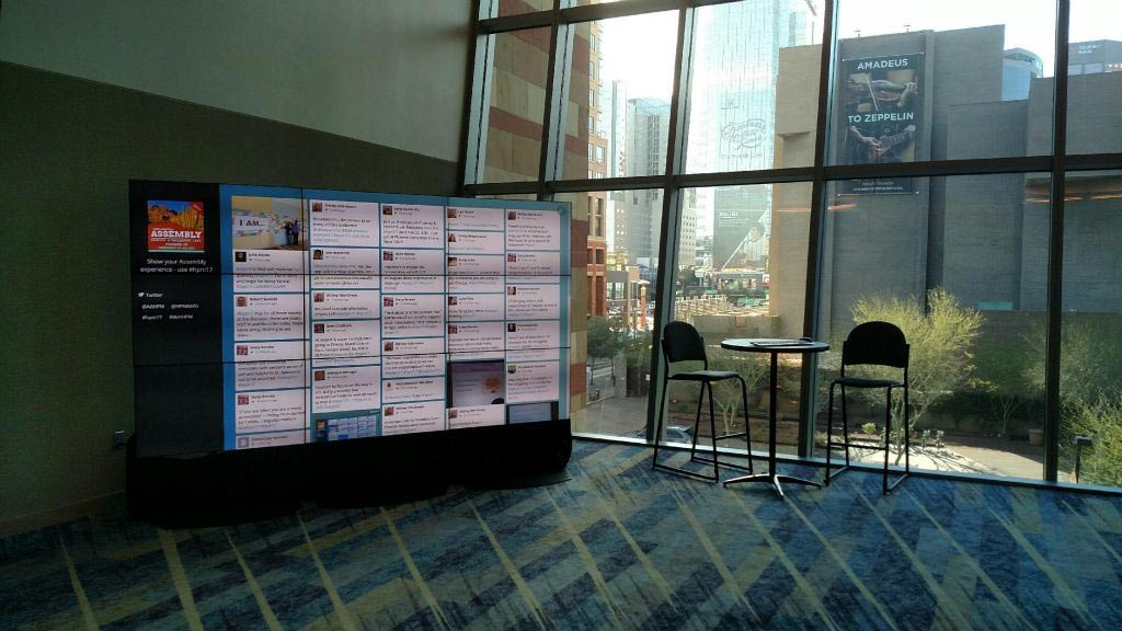 A video wall displaying a social media feed
