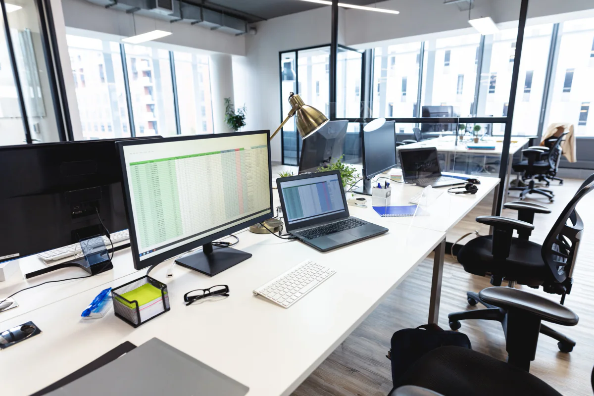 Business monitor setups used for temporary offices registration desks and productivity workstations