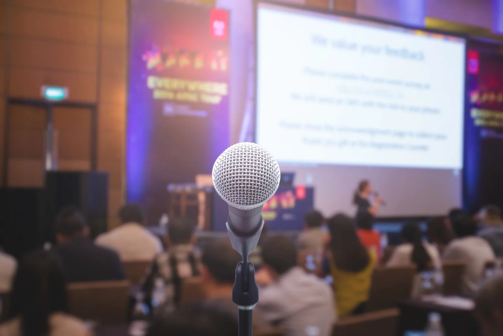 Business presenter using a projector in a conference room for training or internal presentation