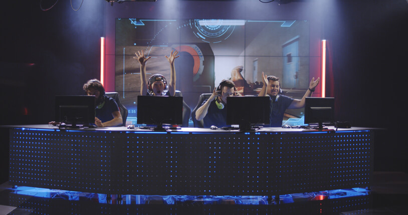 DreamHack Dallas 2023 An eSports team celebrates on stage after a victory