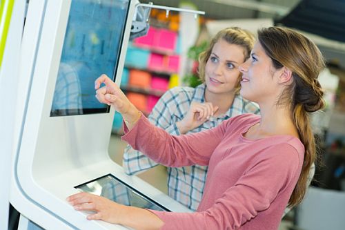 Event Attendees Engaging Using A Kiosk Rental