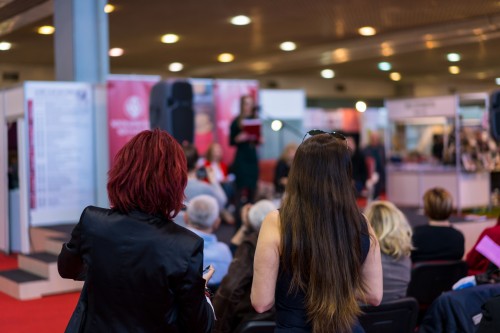 Event attendees watching a presentation