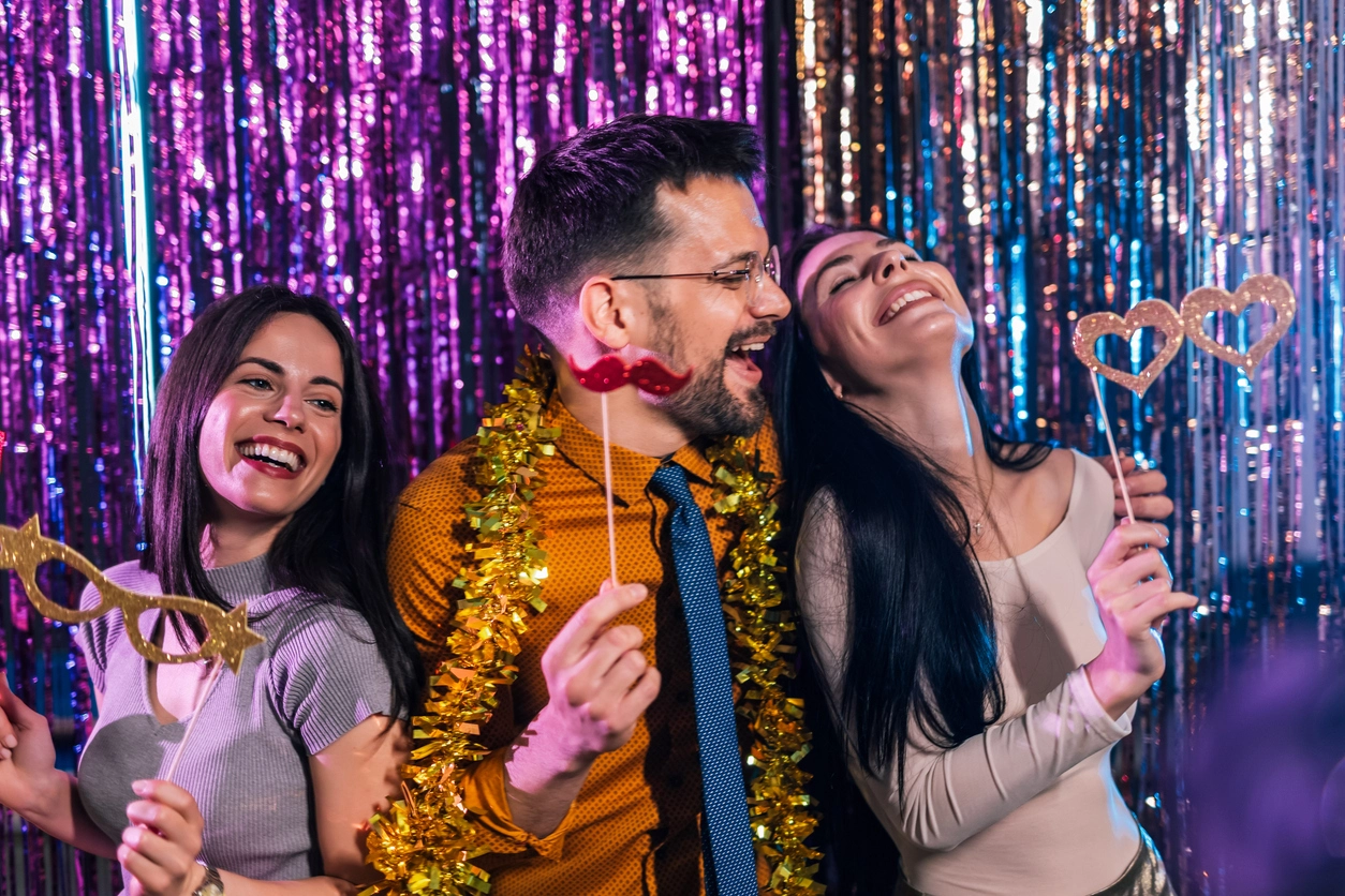 Guests participating in a modern photo booth experience at a professional corporate event