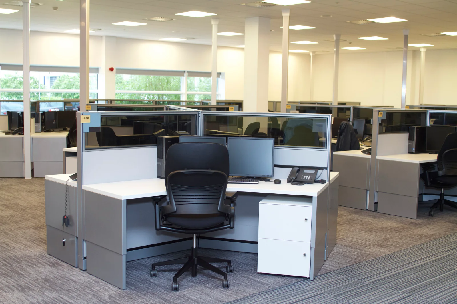 Pop up field office with rental laptops, monitors, printers, and connectivity equipment supporting a temporary project site workspace