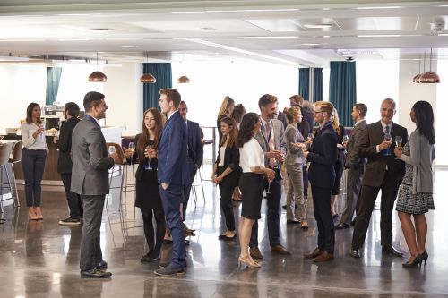 Business people networking in a lobby