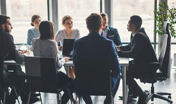 Business people around a conference table