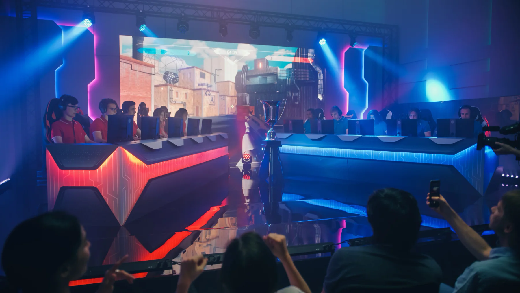 University esports competition with students playing on gaming PCs in a campus event space