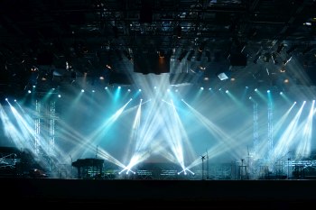 An empty concert stage with production lighting