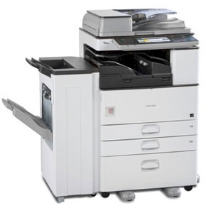 An angled view of a Ricoh copy machine