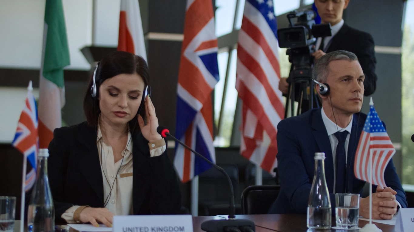 attendees wearing headsets during a multilingual business conference