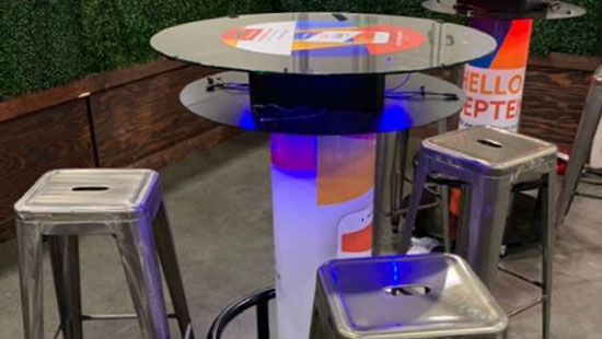 Branded Charging Table in Use