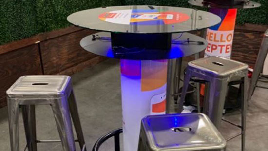 Branded Charging Table in Use Branded Charging Table in Use